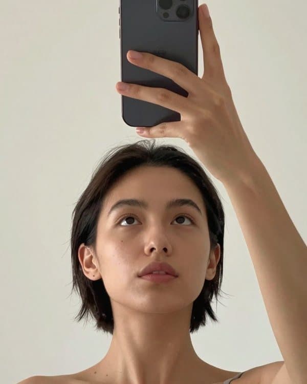 The same woman before and after a bob haircut: before