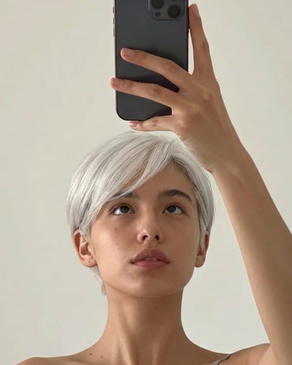 The same woman before and after a pixie cut: after
